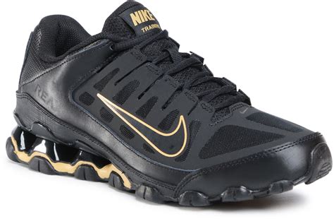 (Nike) Reax 8 TR Black/Gold Trainers in Black .